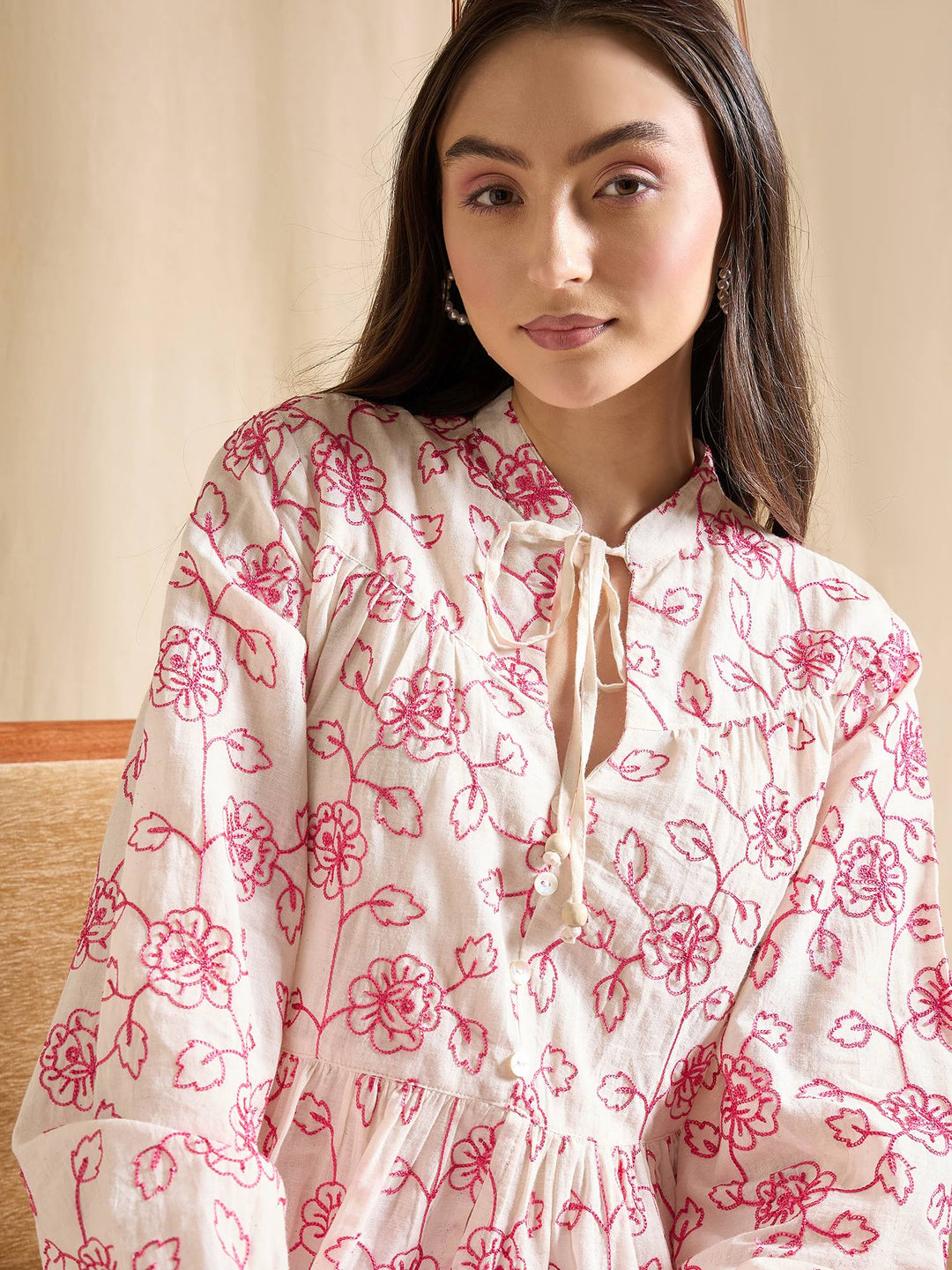 Floral Embroidered Cotton Peplum Top with Tie-Up Neck